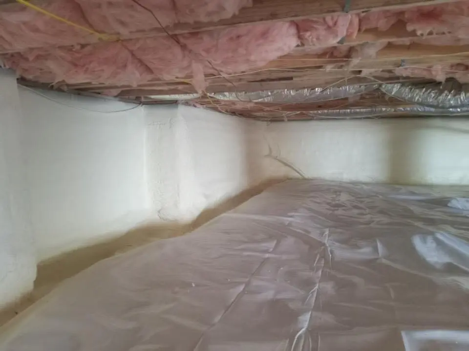 Crawl space encapsulation with closed-cell spray foam for Commercial Roof Restoration in Huron
